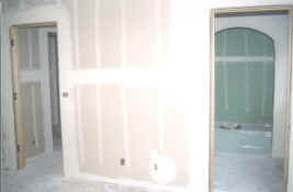 Guest bedroom drywall installed- from Northwest.jpg (780618 bytes)