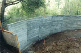 driveway first curve downhill retaining wall concrete.jpg (1337162 bytes)