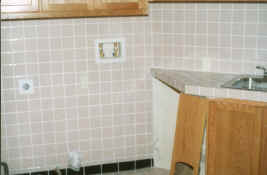 laundry room with tile and trim installed.jpg (1260063 bytes)