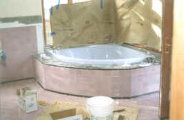 master bath tub with tile installed.jpg (992294 bytes)