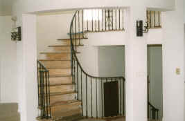 rec room turret stairs with wrought iron installed.jpg (231579 bytes)